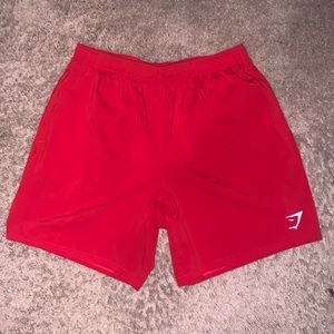 Gymshark Arrival 7 inch shorts-Sports Red- Large
